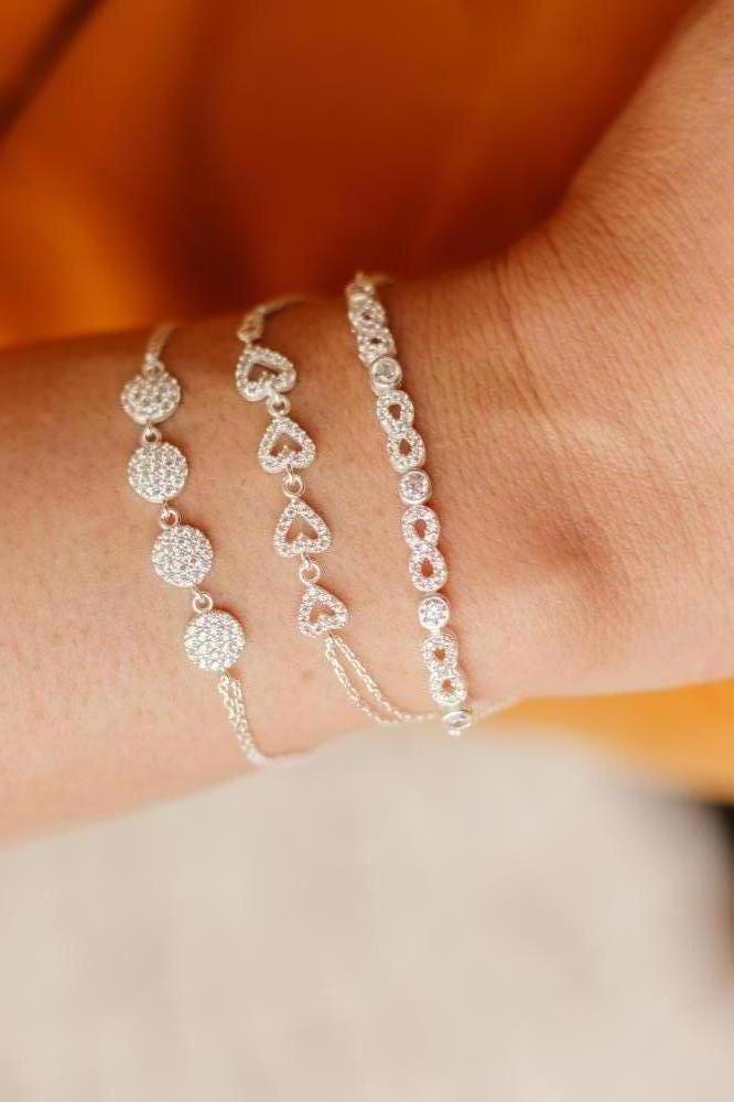 PULSEIRA PRATA 4 CORAÇÕES CRAVEJADO CRISTAL