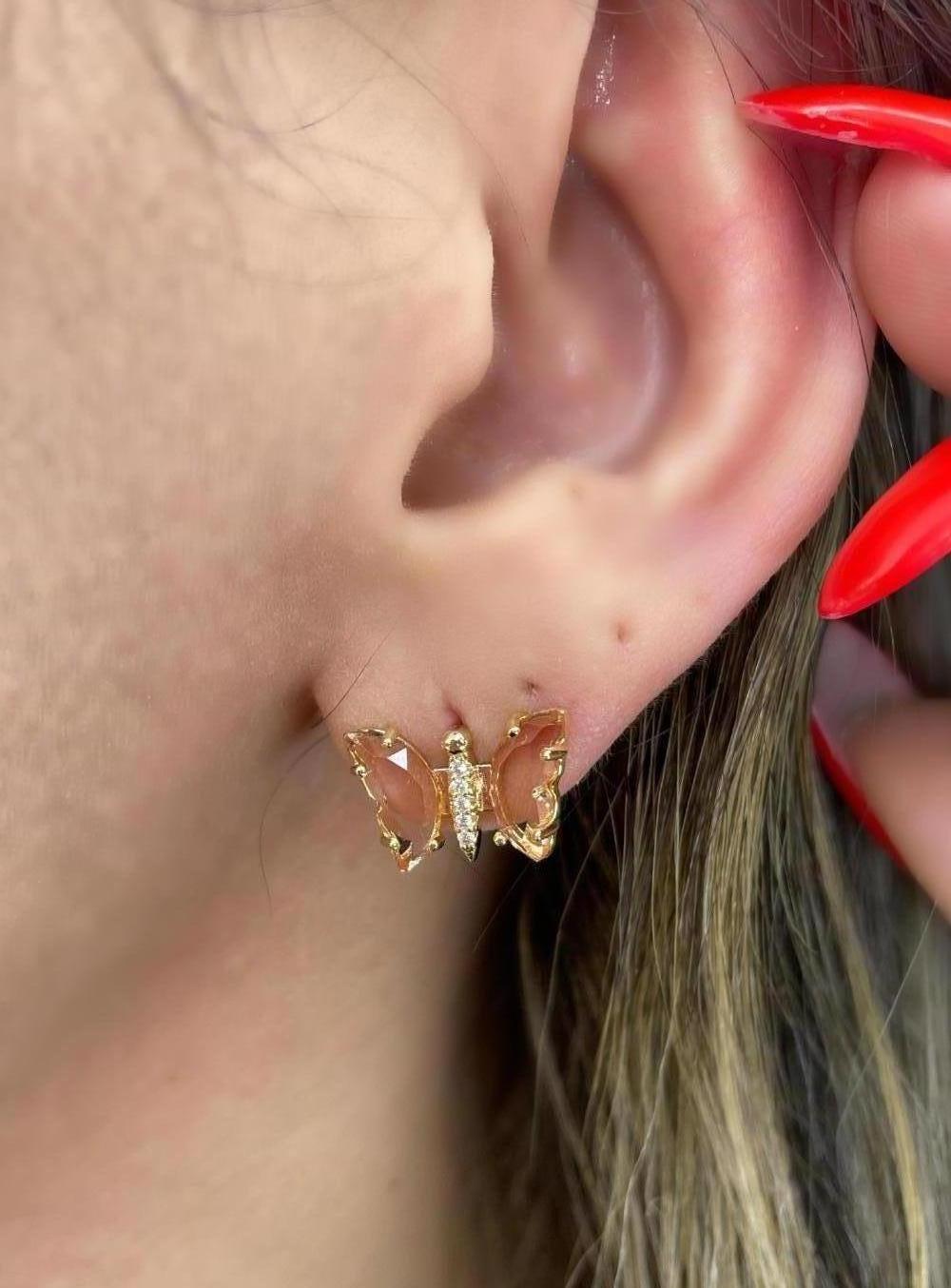 BRINCO BORBOLETA CRAVEJADA PESSÊGO