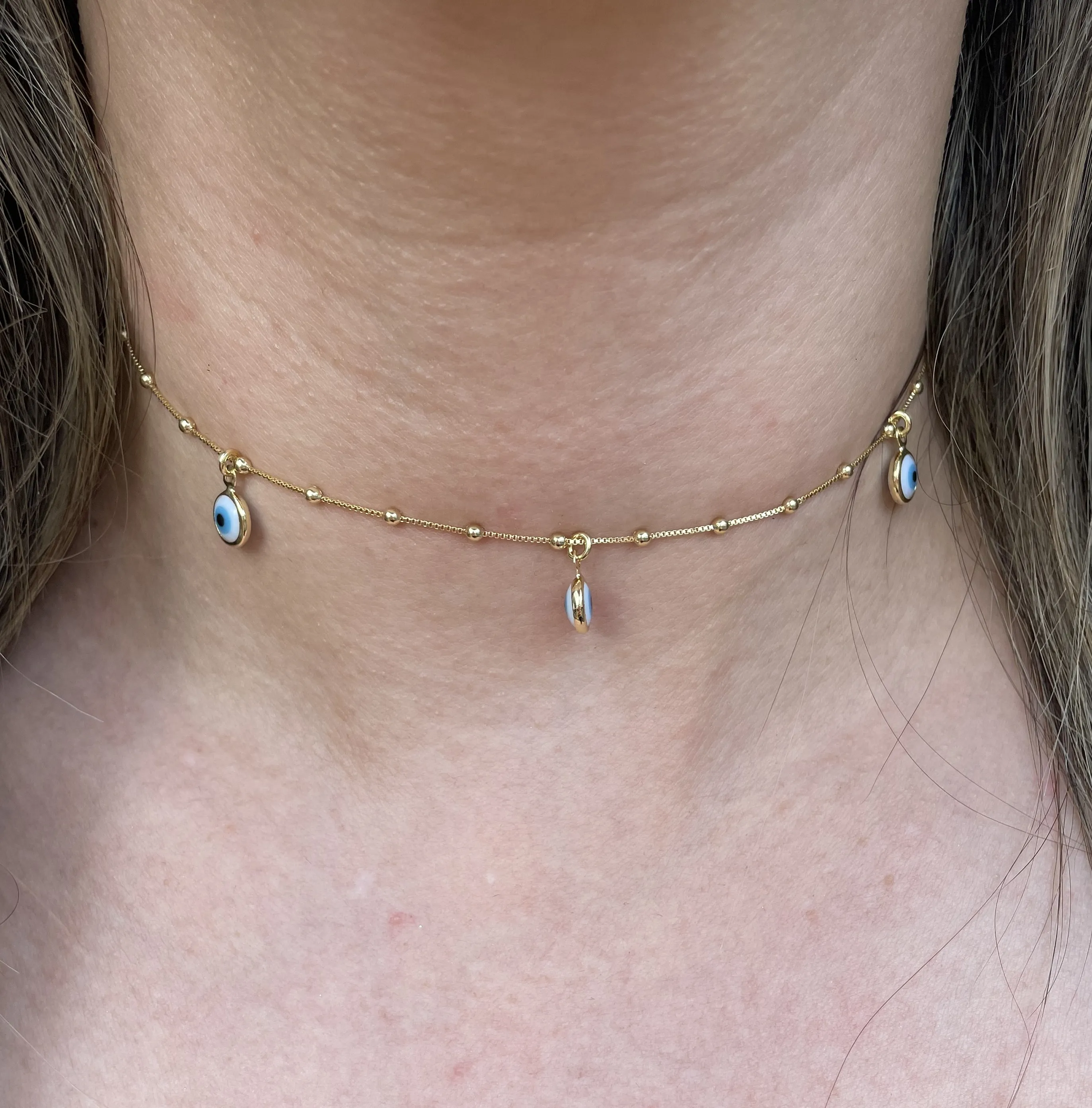 CHOKER OLHO GREGO