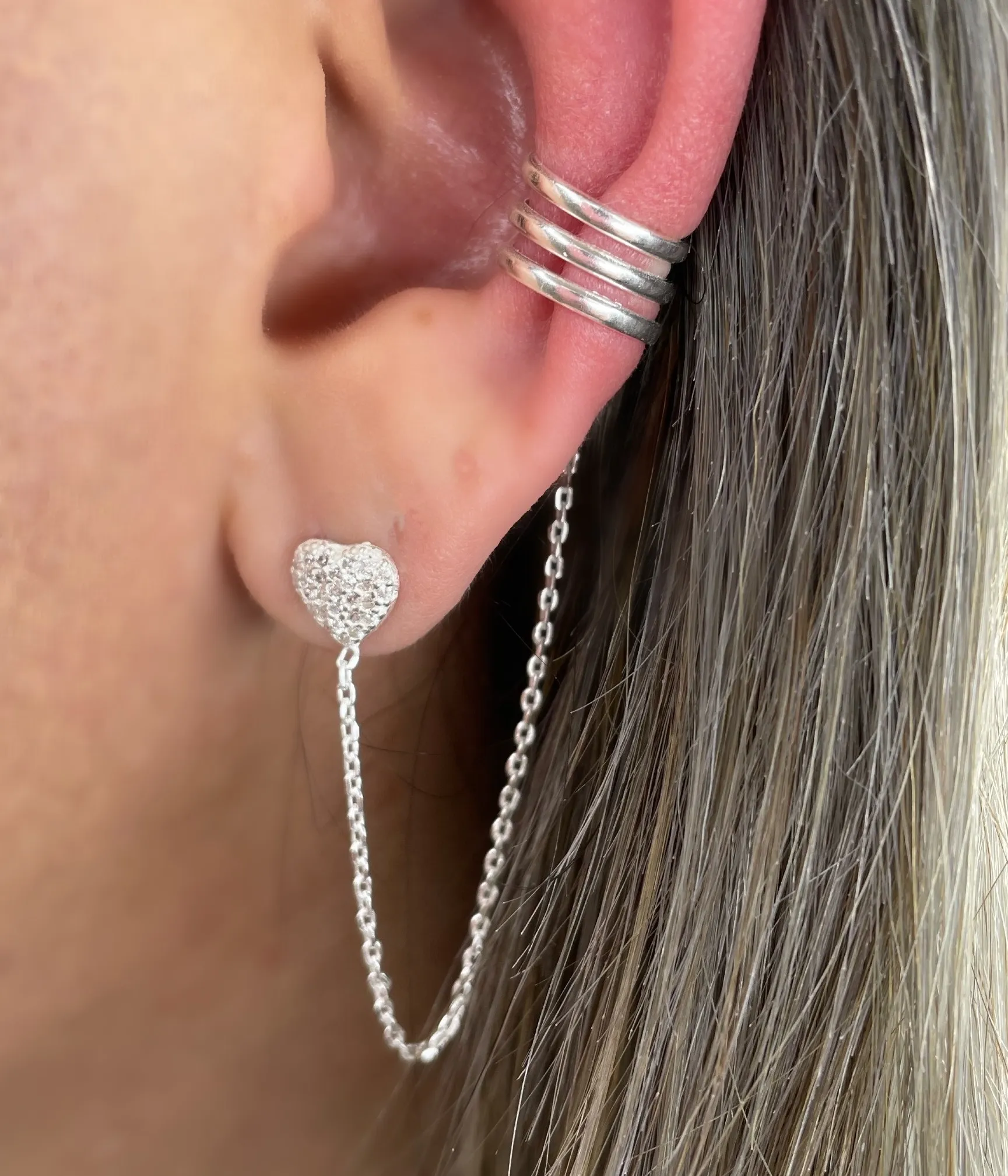 BRINCO PRATA CORAÇÃO CRAVEJADO COM PIERCING FAKE
