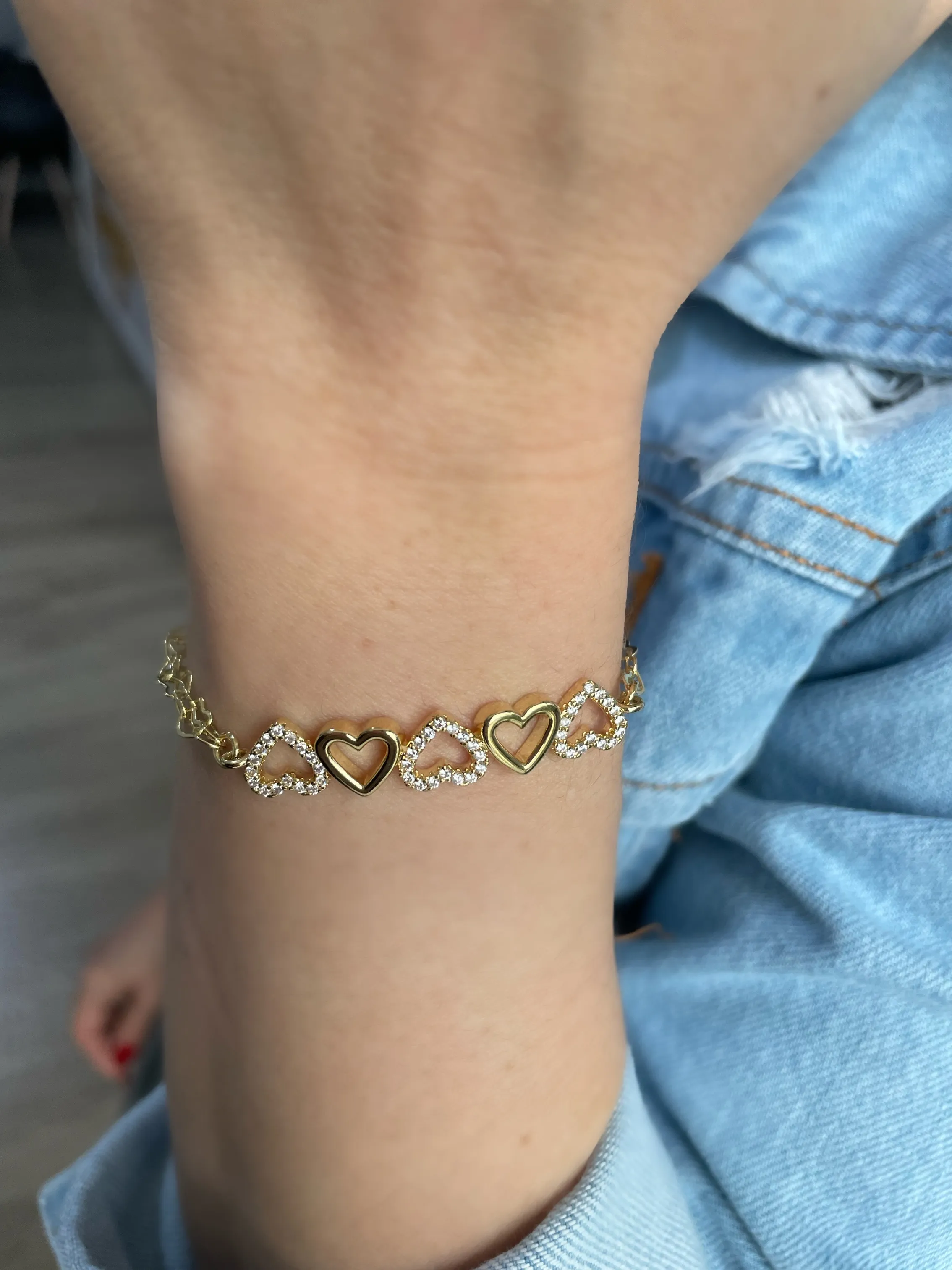 PULSEIRA CORAÇÃO VAZADO E CRAVEJADO