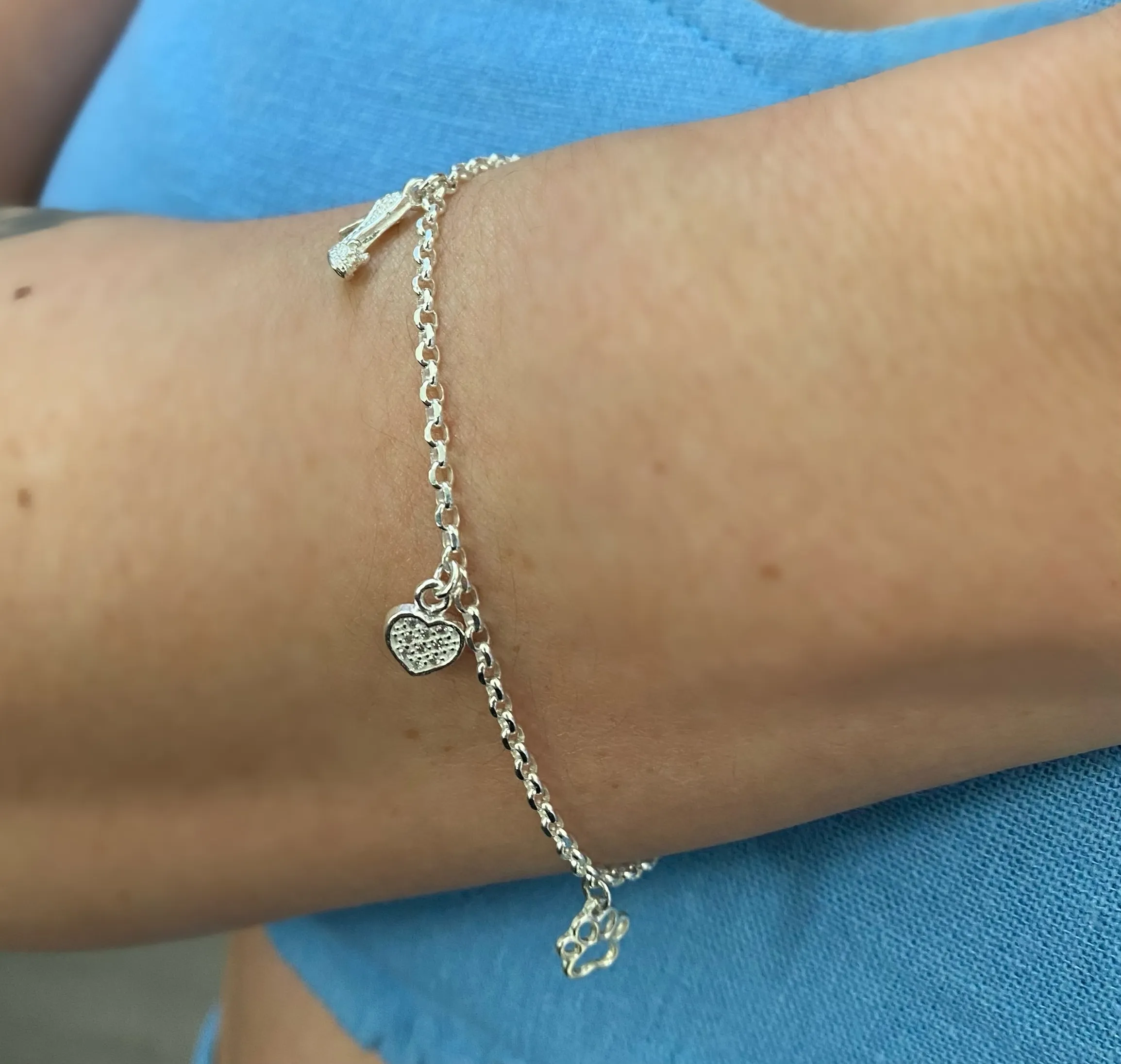PULSEIRA PRATA CORAÇÃO SAPATO E PATINHA