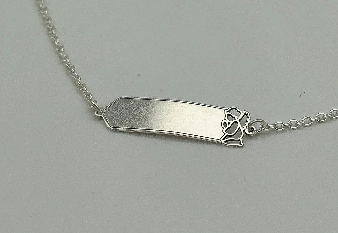 PULSEIRA PRATA INFANTIL PLAQUINA ANJO