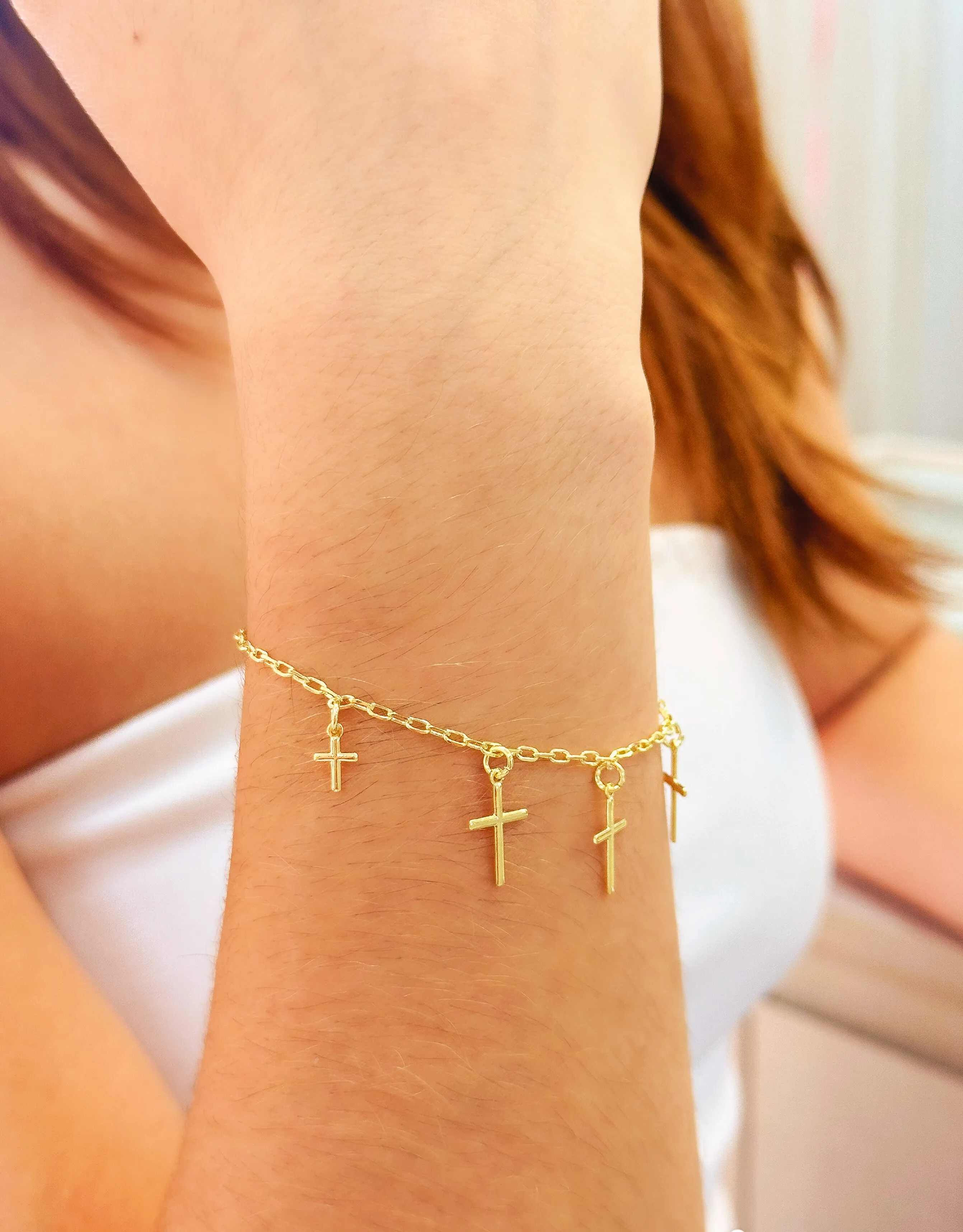 PULSEIRA CRUZ PENDURADA