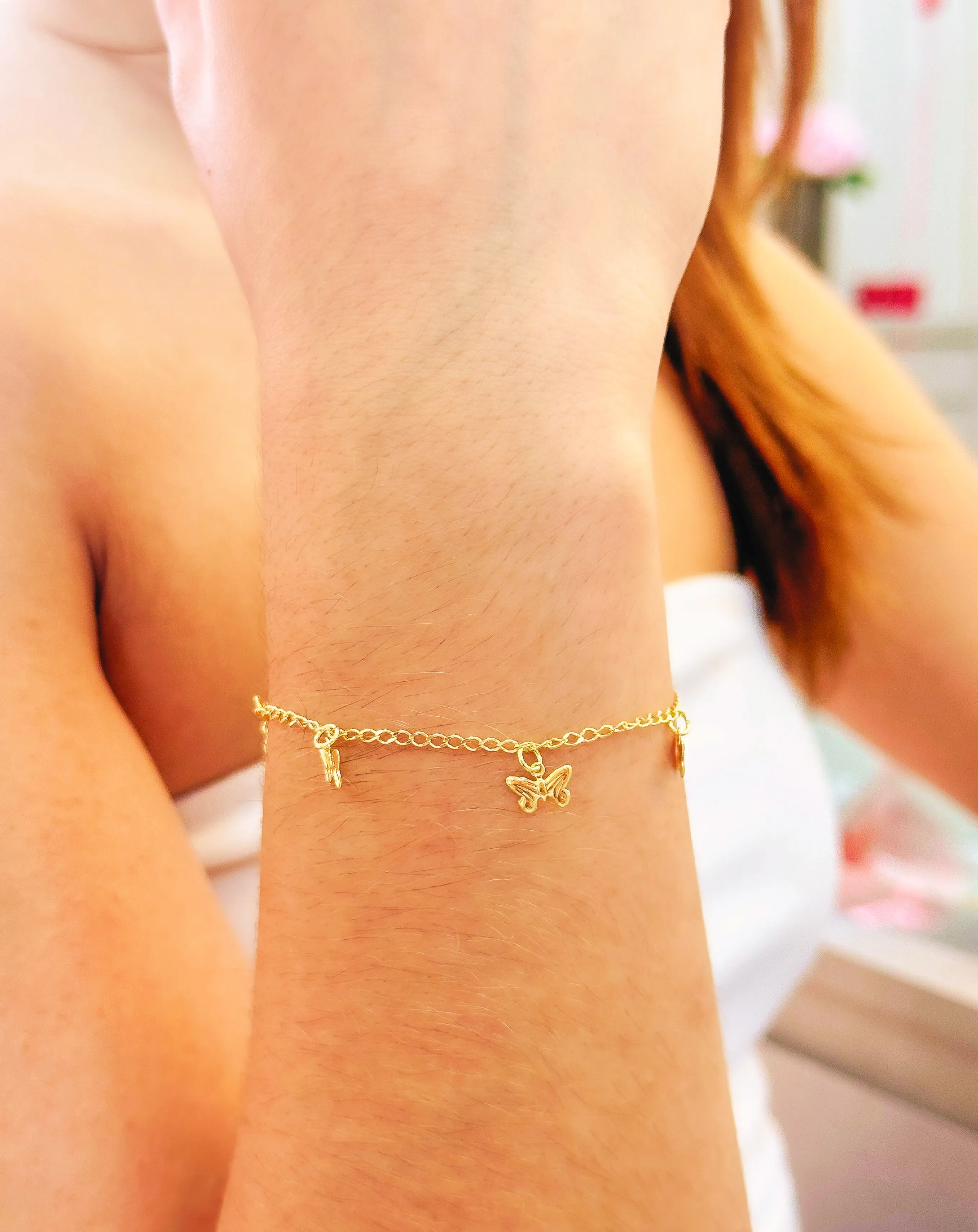 PULSEIRA BORBOLETAS PENDURADAS