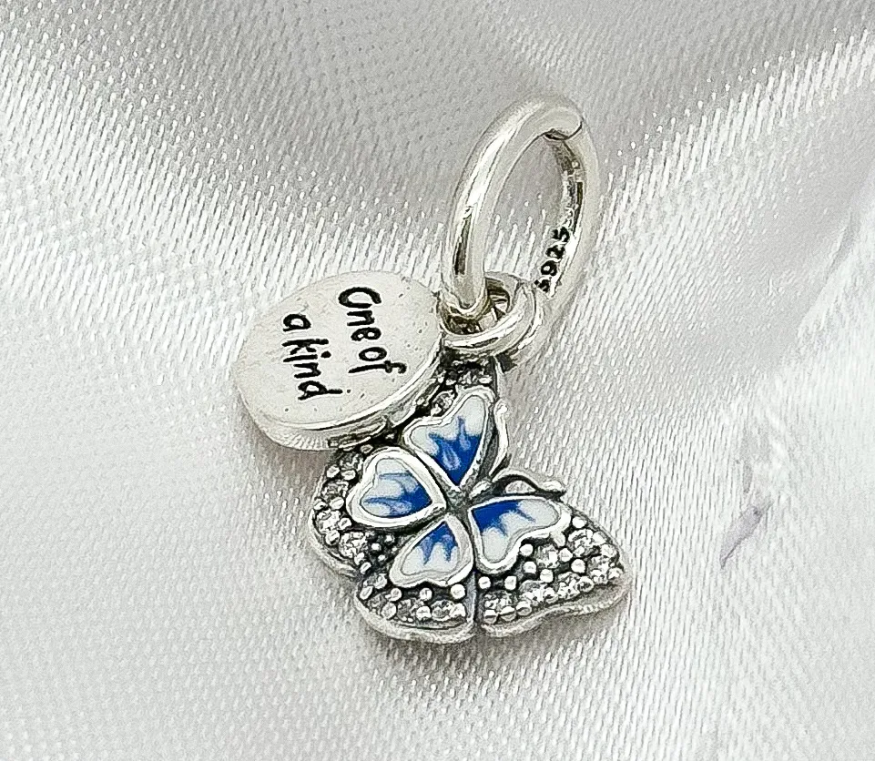 BERLOQUE PRATA BORBOLETA CRAVEJADA COM MEDALHA