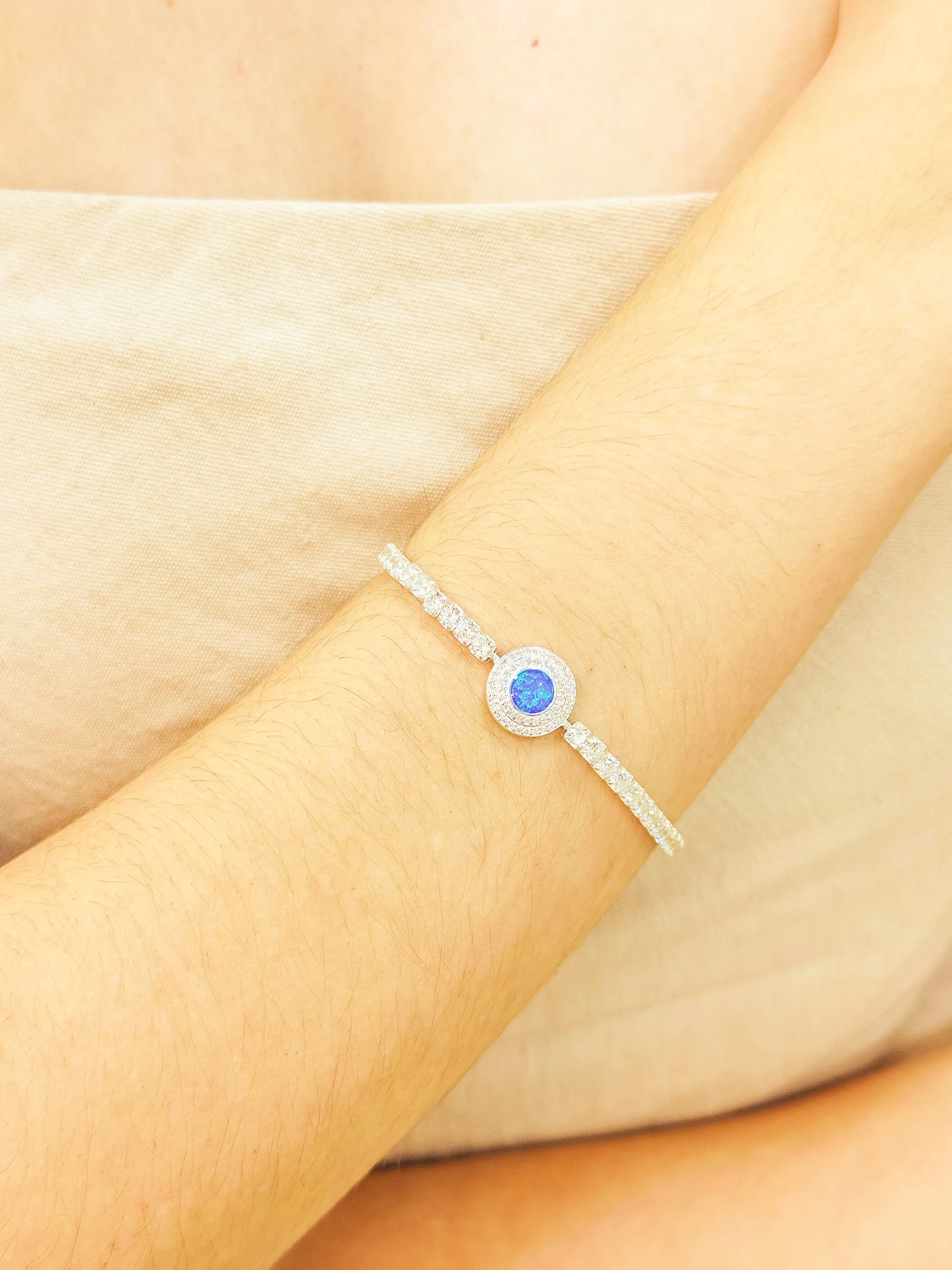 PULSEIRA PRATA RIVIERA ESFERA CRAVAJDA COM PEDRA OPALA REGULÁVEL