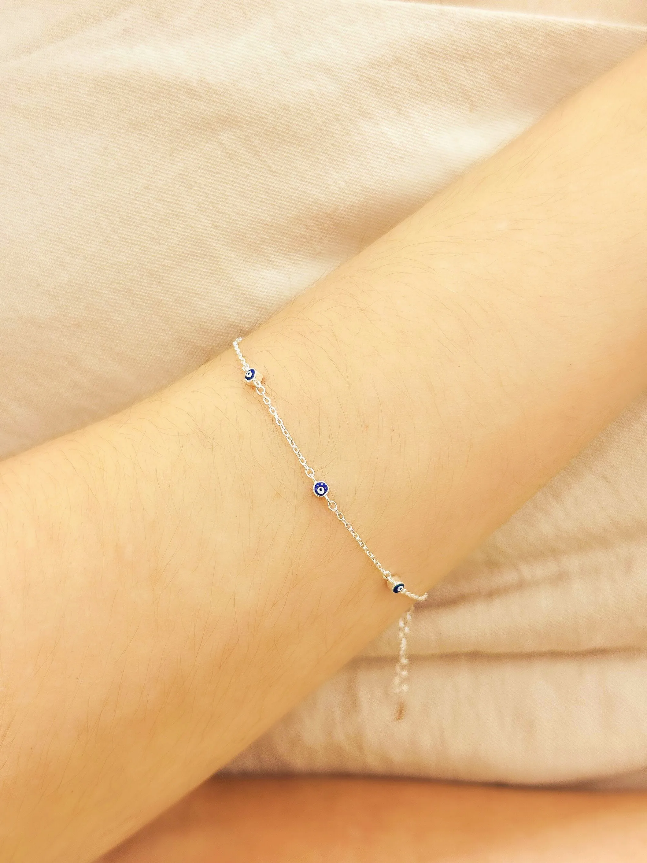 PULSEIRA PRATA 5 OLHO GREGO