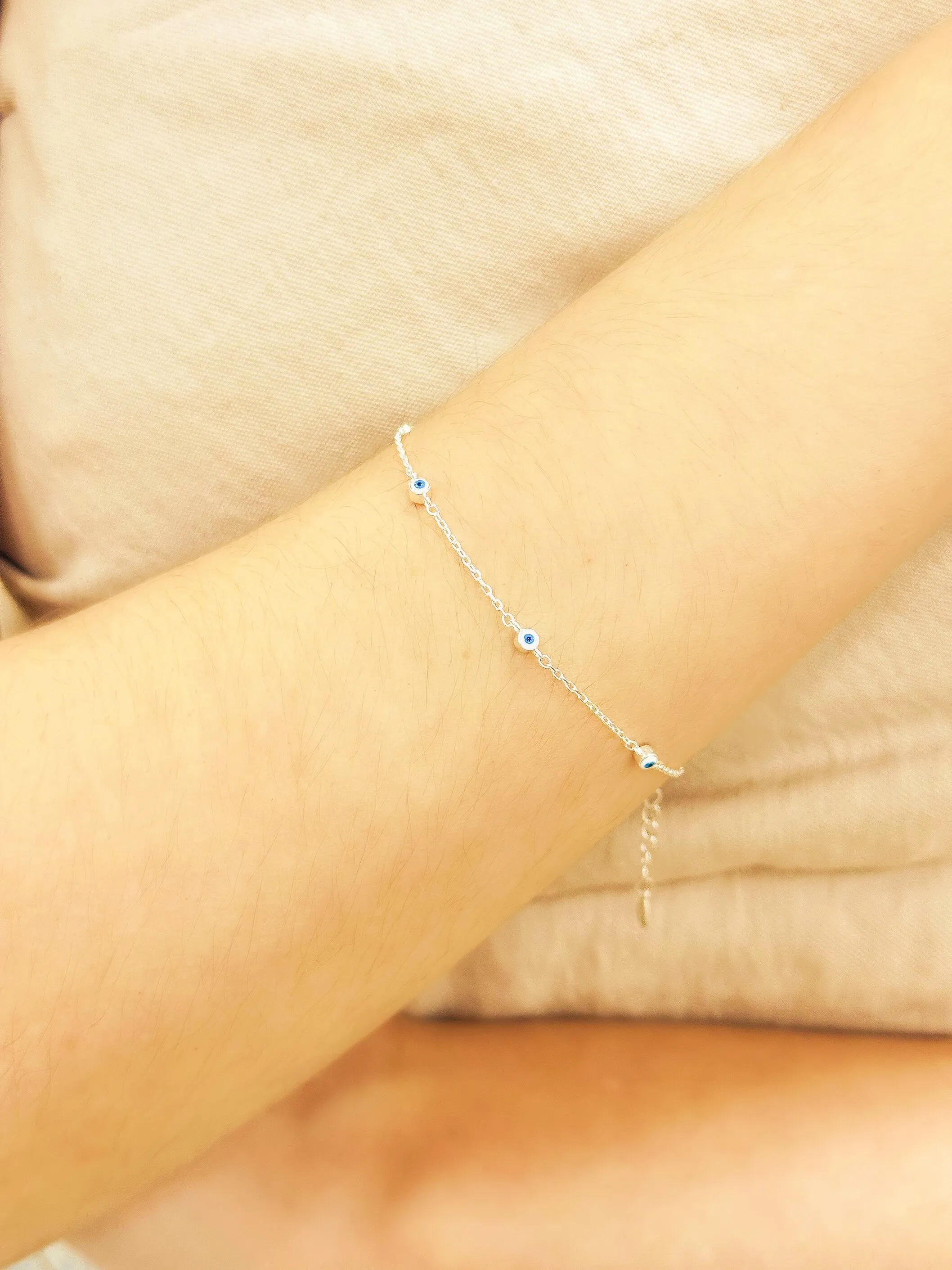PULSEIRA PRATA 5 OLHO GREGO