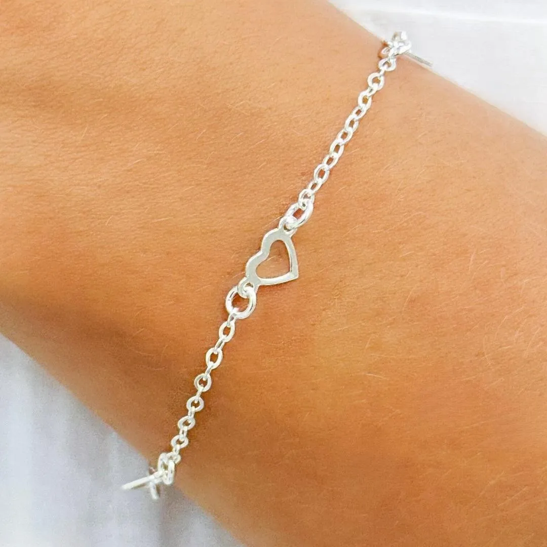 PULSEIRA PRATA CORAÇÕES VASADOS