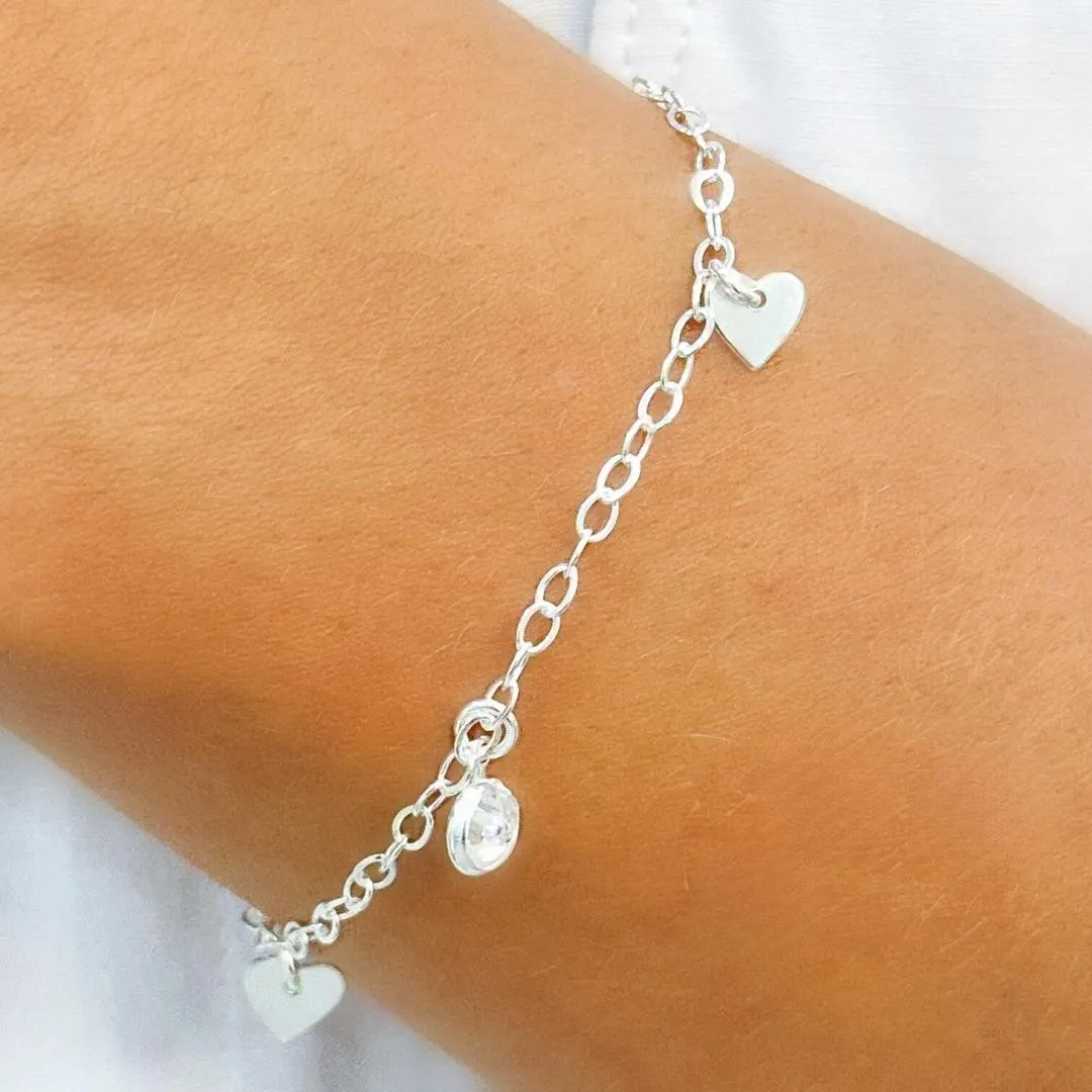 PULSEIRA PRATA PONTO DE LUZ E CORAÇÕES