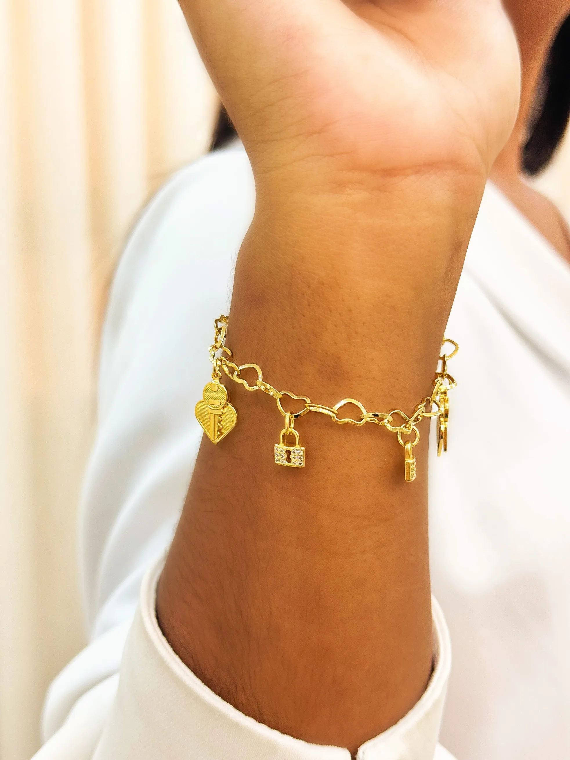 PULSEIRA  ELO CORAÇÃO CHAVE E CADEADO CRAVEJADO