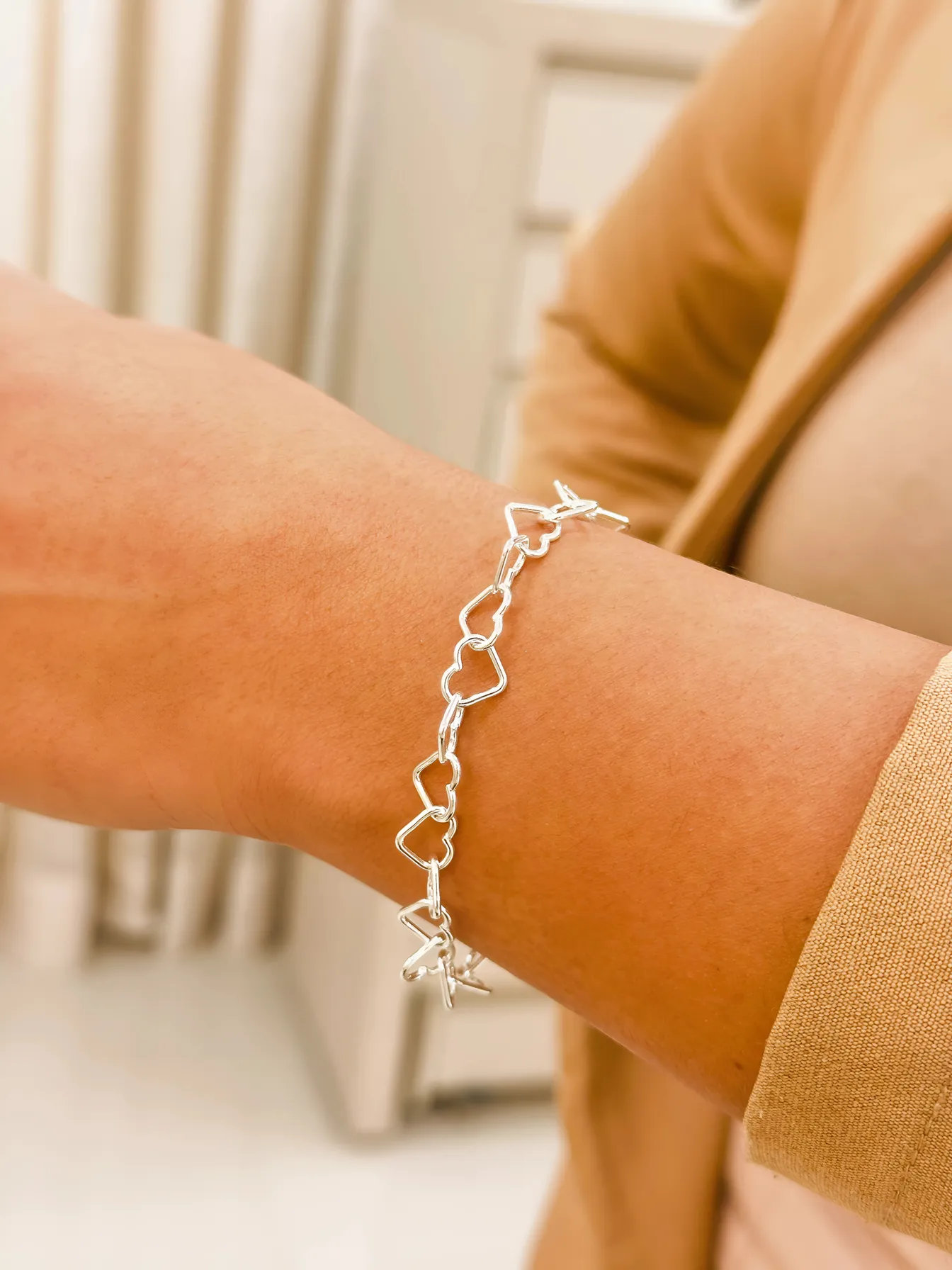 PULSEIRA PRATA CORAÇÃO VAZADO FIO 100
