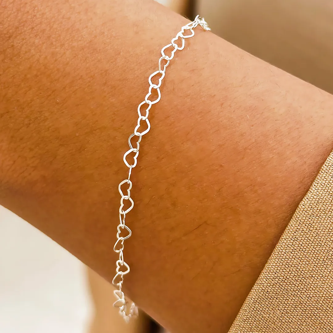 PULSEIRA PRATA CORAÇÃO VAZADO 0,40