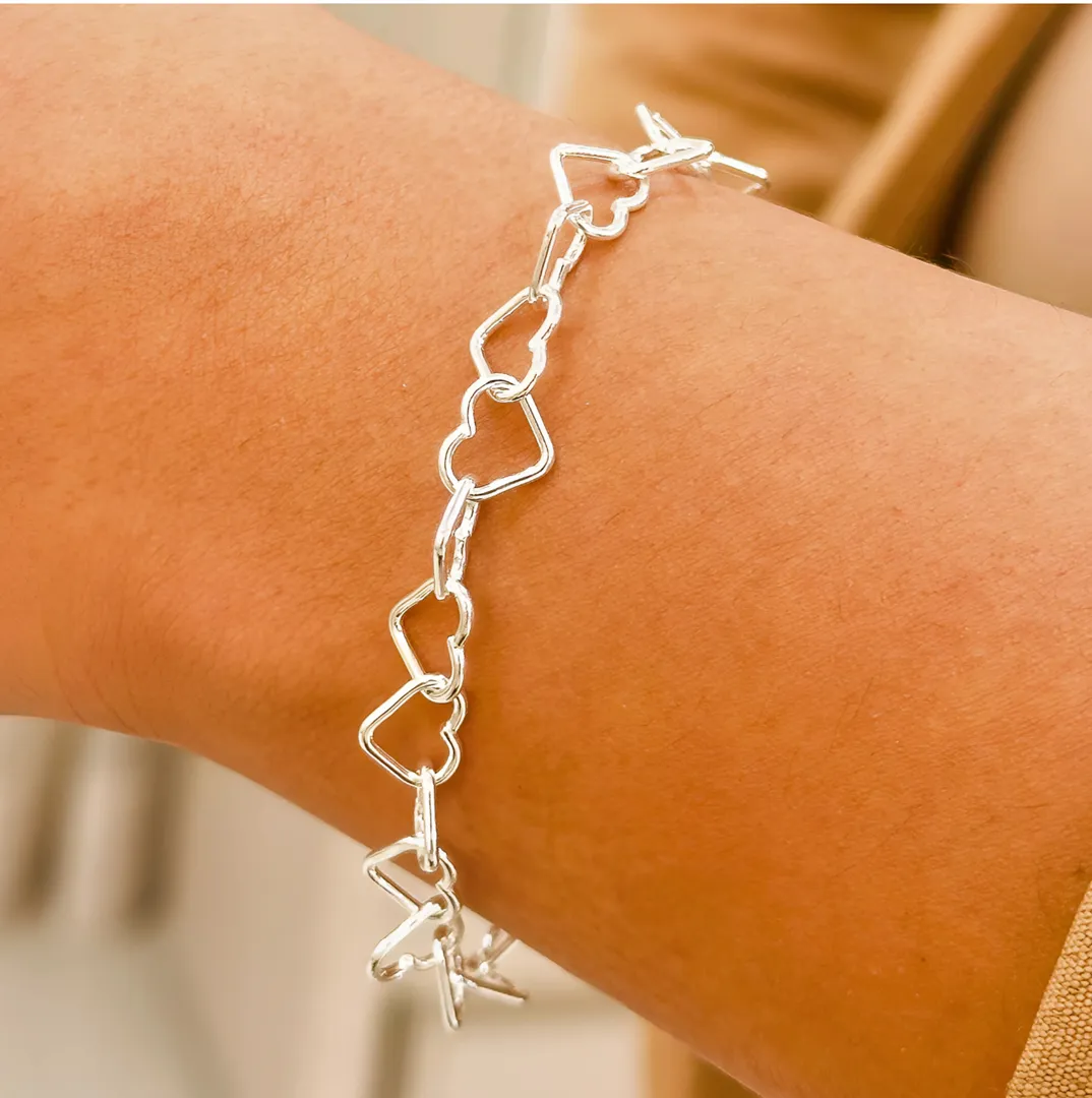 PULSEIRA PRATA CORAÇÃO VAZADO FIO 100